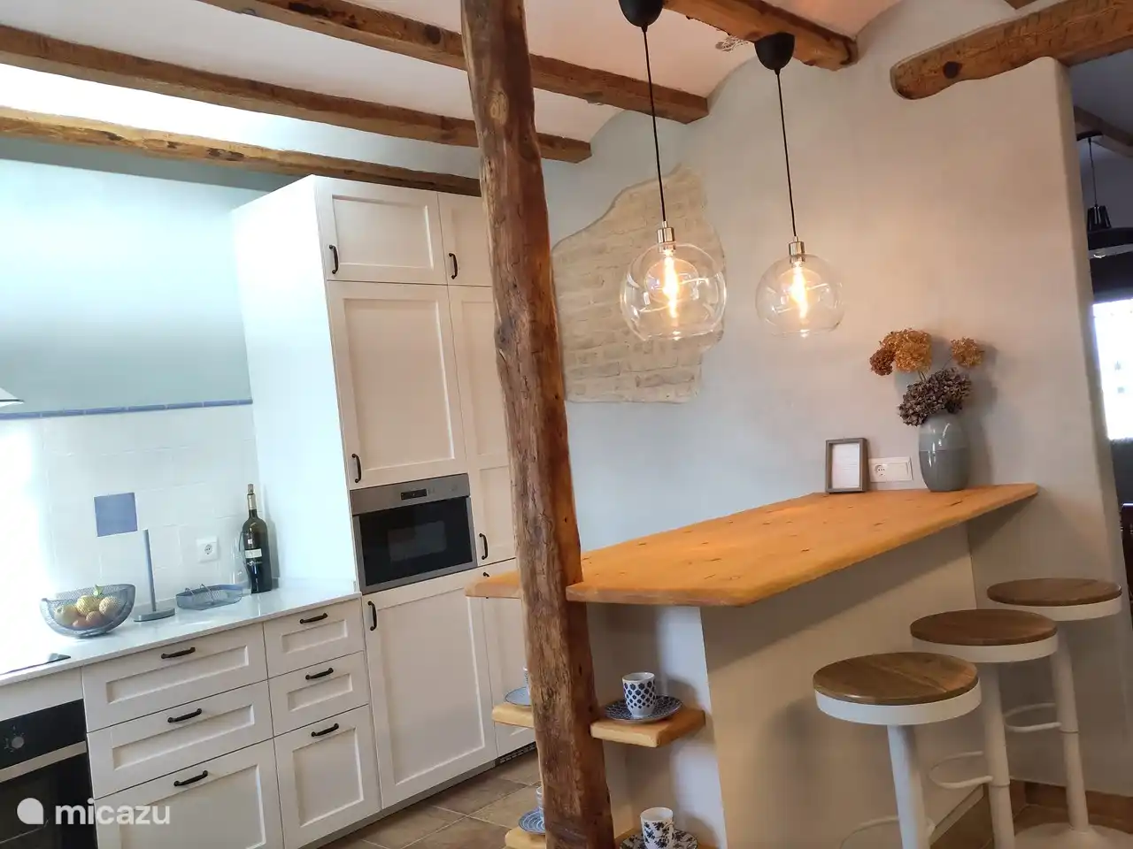 The open kitchen has been completely renovated.