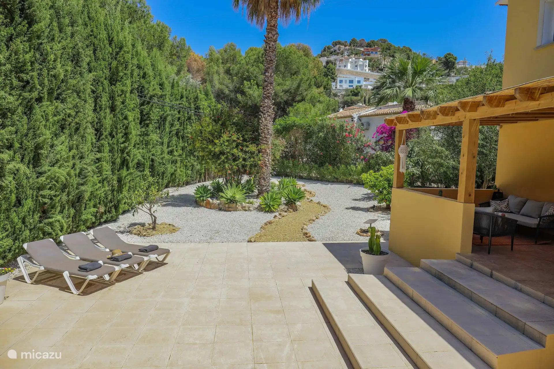 The sunbeds and the terrace