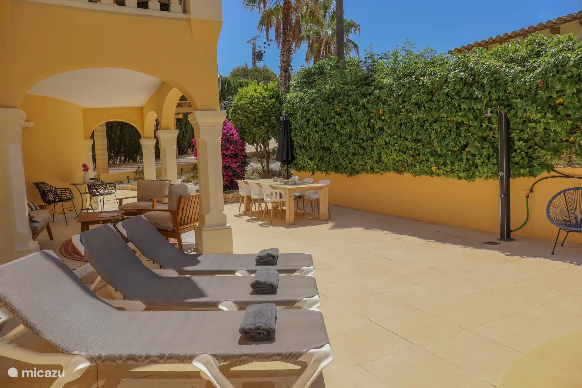 The sunbeds and the terrace