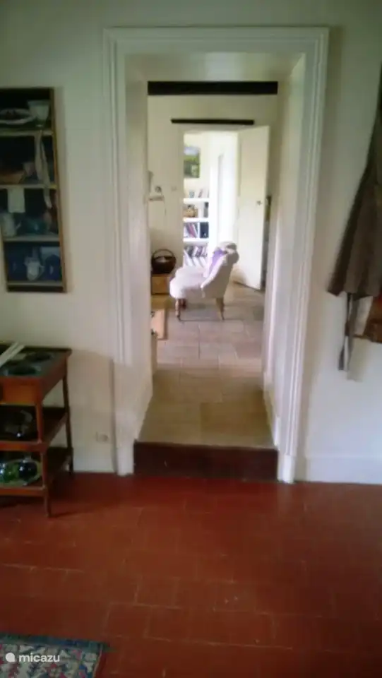view from the kitchen to the living room and the library
