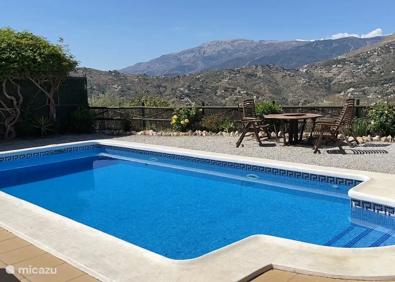 A spacious swimming pool to cool off in