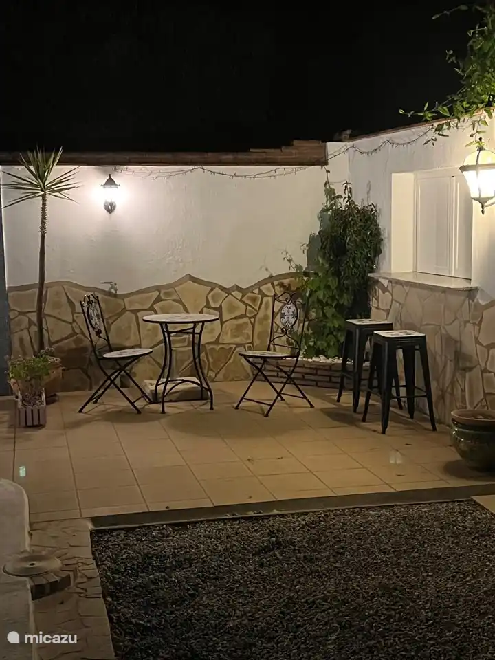 Sitting area behind the pool