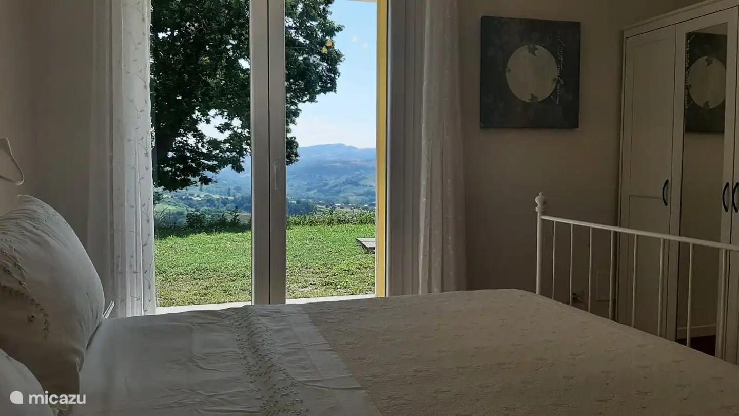 The 2 person bedroom, here you can see the view from the room to the garden