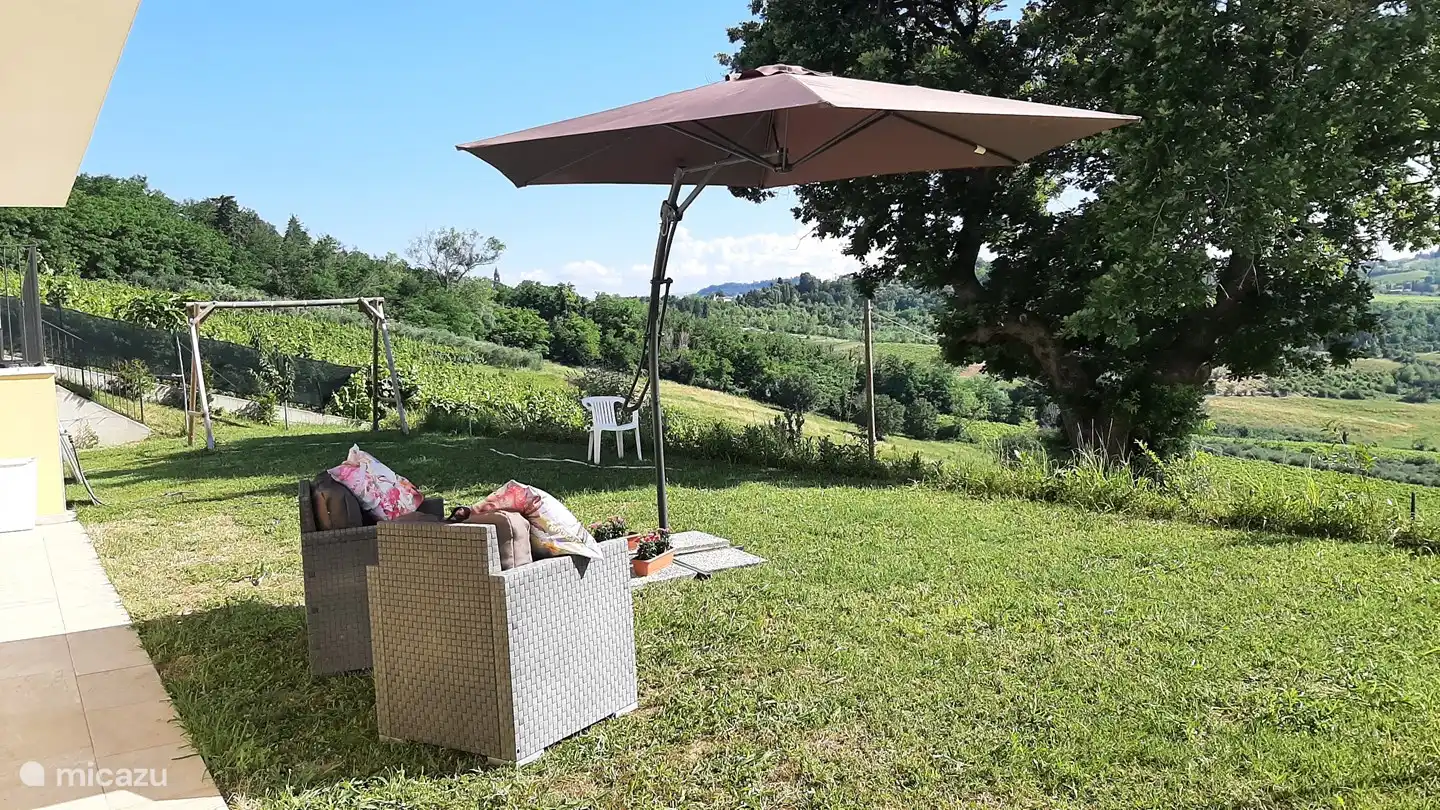 a second seat in the garden of the holiday apartment.