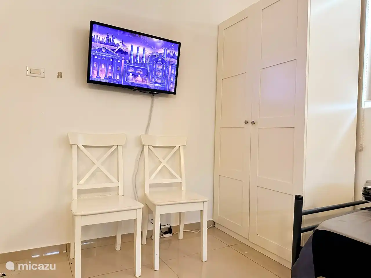 TV with Roku in bedroom 2.