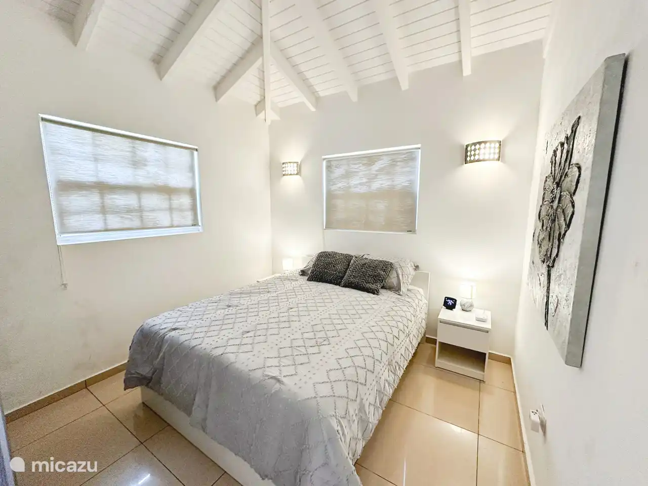 Bedroom 3. Full bed, side tables with power station, lamps, wardrobe, AC, digital AC thermostat.