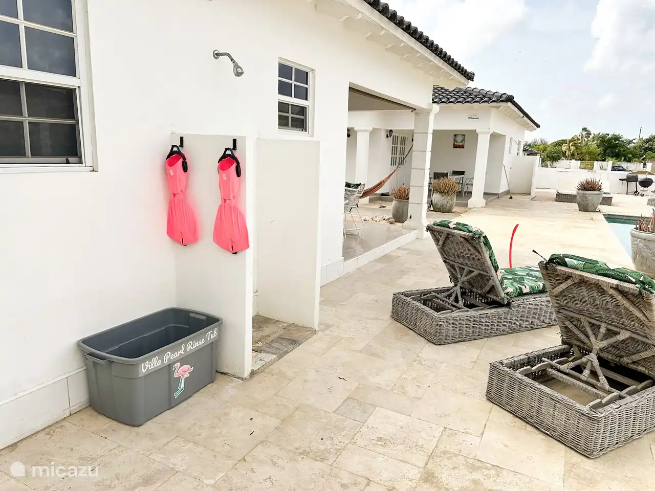 Outdoor shower with rinse tub. Heavy duty equipment hangers.