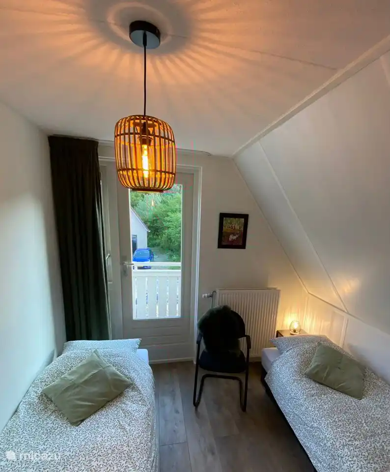 Slaapkamer met balkon