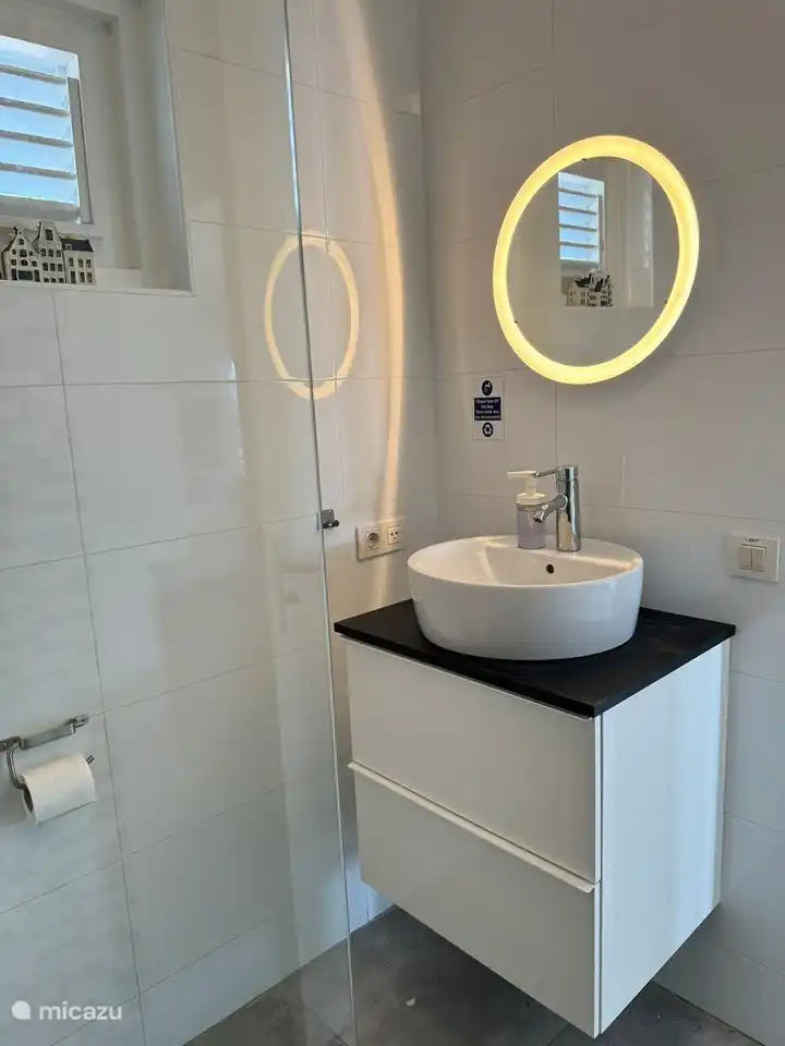 Waschbecken im privaten Badezimmer der Gästezimmer I und II.