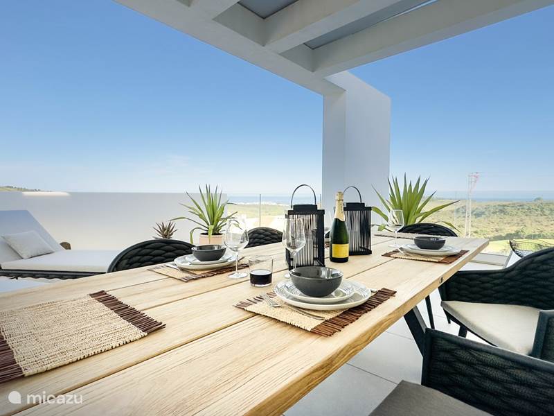 Vakantiehuis Spanje, Costa del Sol, Estepona Penthouse Oase voor golfers: spectaculair uitzicht