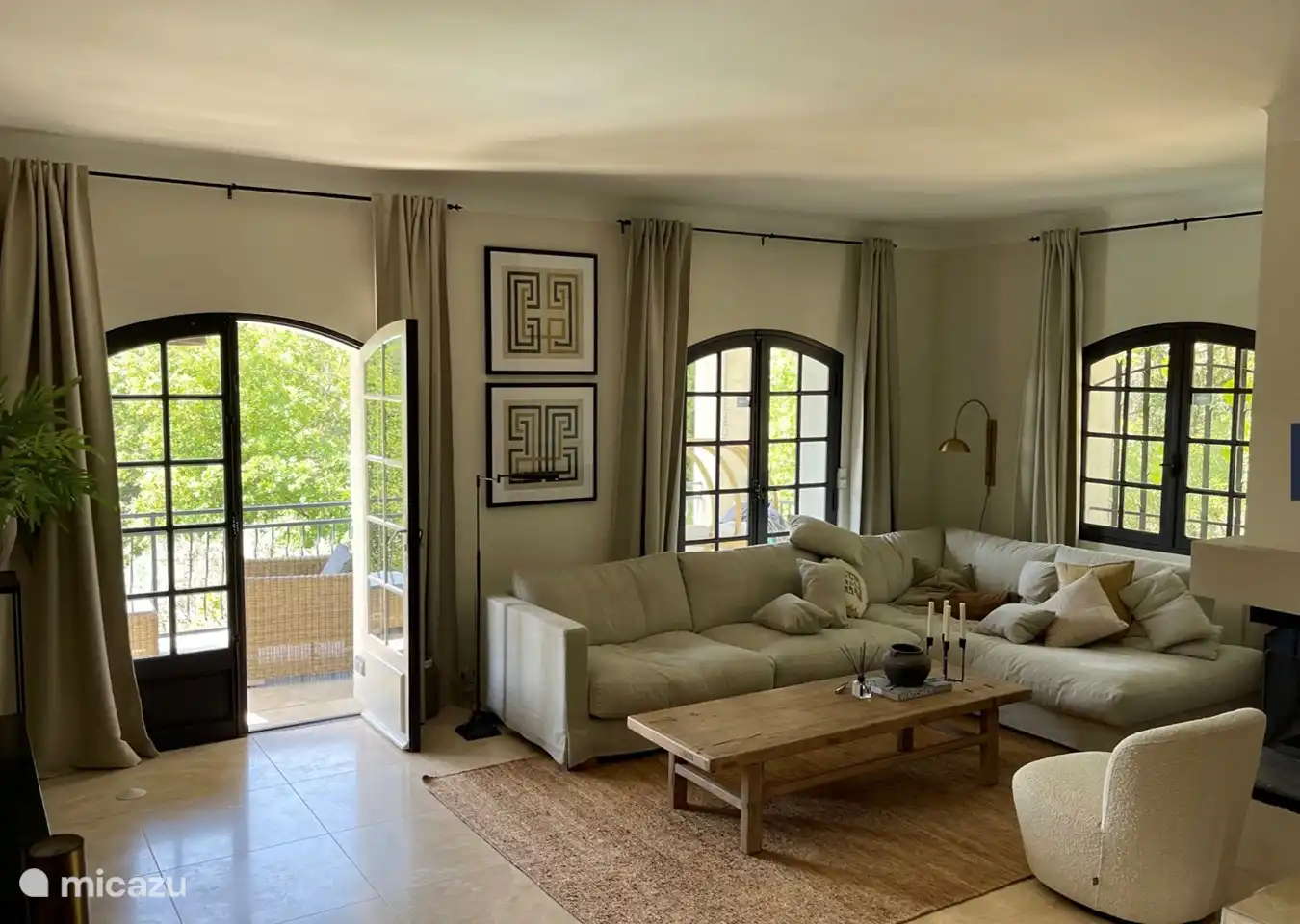 spacious comfortable living room with large lounge sofa