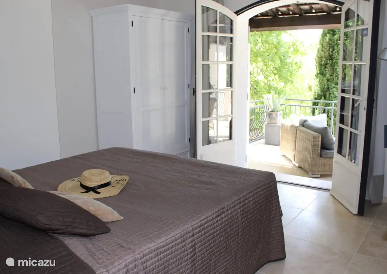 second bedroom with patio doors to the terrace