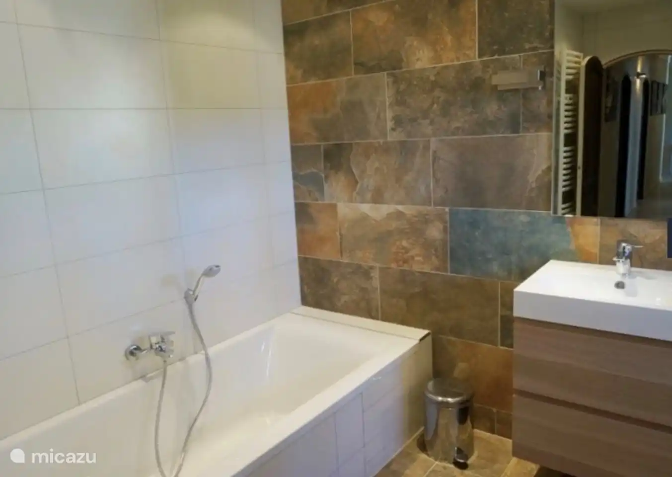 Spacious bathroom with bath