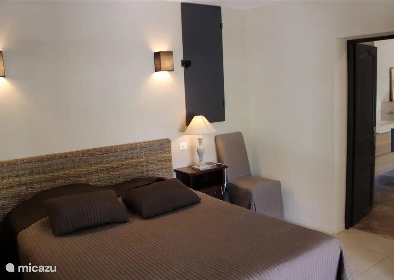 downstairs bedroom with adjoining bathroom