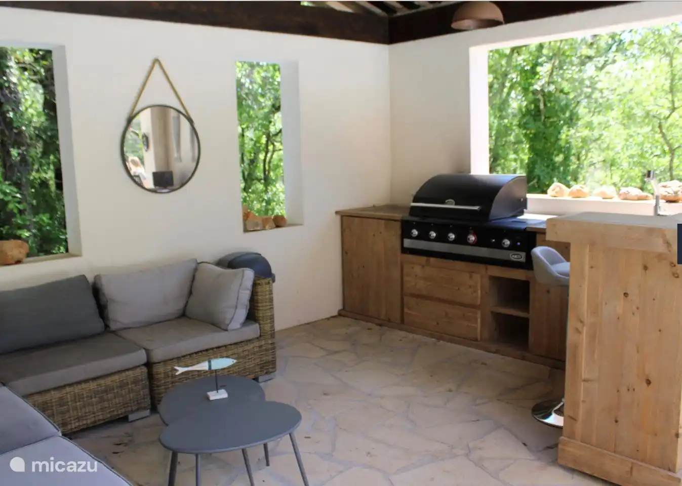 Pool house with barbecue and refrigerator