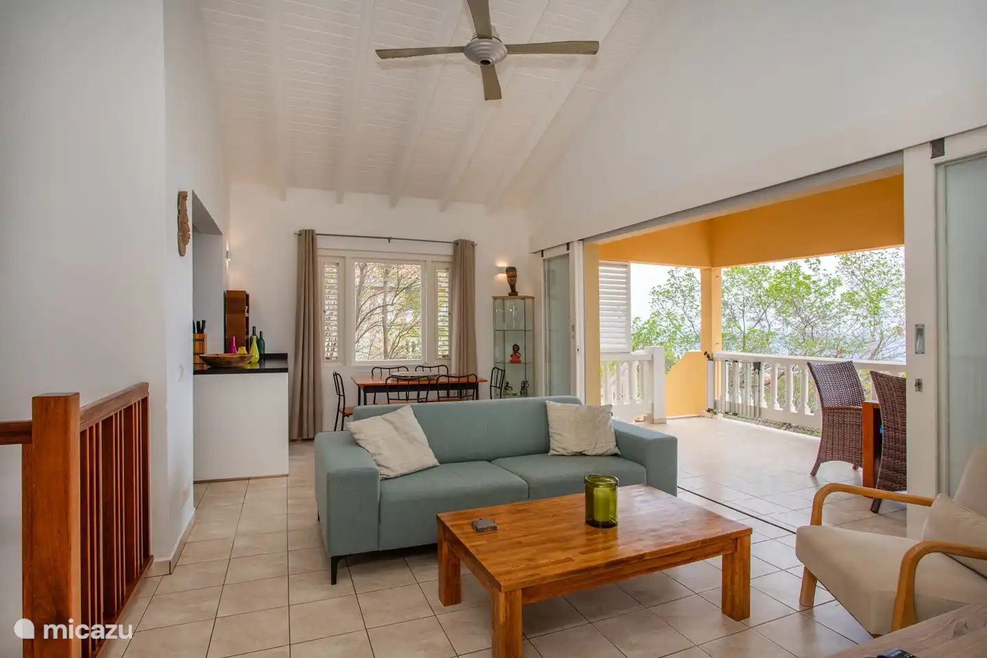 Ground floor living room with open kitchen in the back left