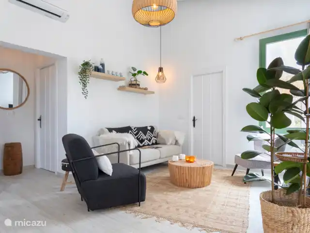 Finca Can Faye huren in Spanje, Andalusië, Riogordo - finca De woonkamer met zithoek en televisie