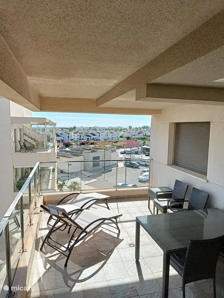 Avondzon op het balkon.