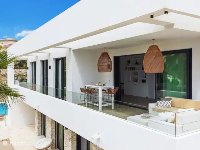 Villa Andrago | Moraira | 8 pers. huren in Spanje, Costa Blanca, Moraira - villa De woonkamer heeft grote schuifdeuren die toegang even tot een ruim balkon