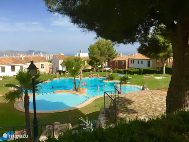 Location de Vacances Espagne, Costa Blanca, Benidorm, maison mitoyenne - Casita El Mirador Maison avec vue. Avec vue sur les toits de Benidorm et la mer.