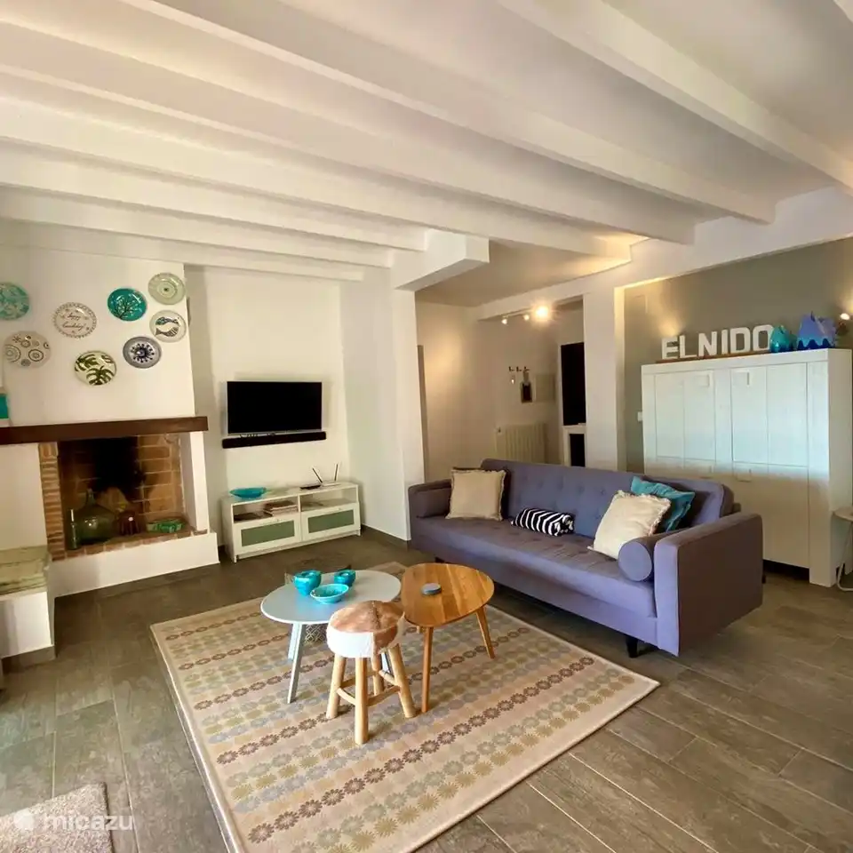 De gezellige woonkamer van Villa El Nido is het centrale deel van de woning