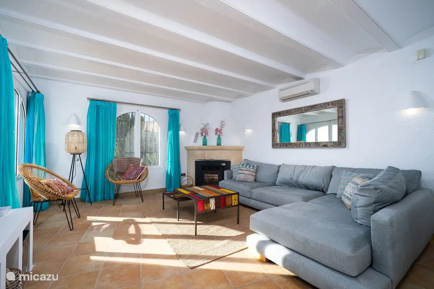 The cozy living room of Villa Bahia del Portet with sea view