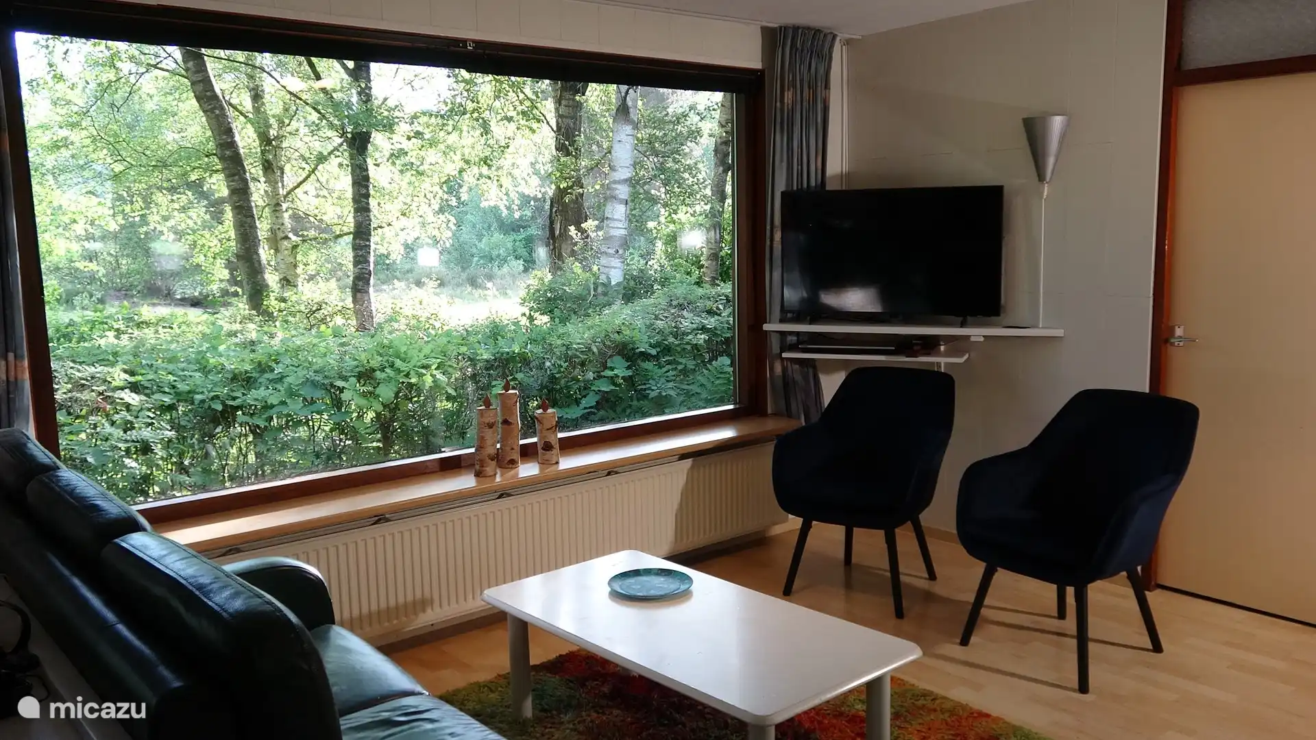 De zithoek met uitzicht op het kikkerven