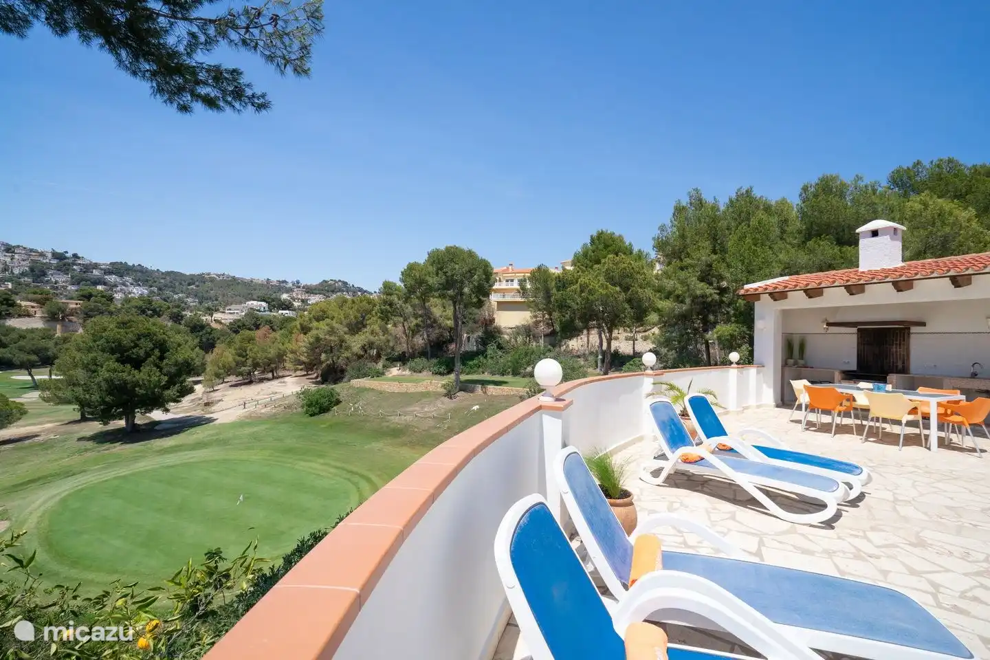 Villa Naranja has a spacious terrace around the pool