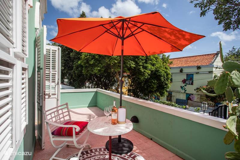 Vakantiehuis Curaçao, Curacao-Midden, Willemstad Stadswoning Kleurrijk appartement in Otrabanda