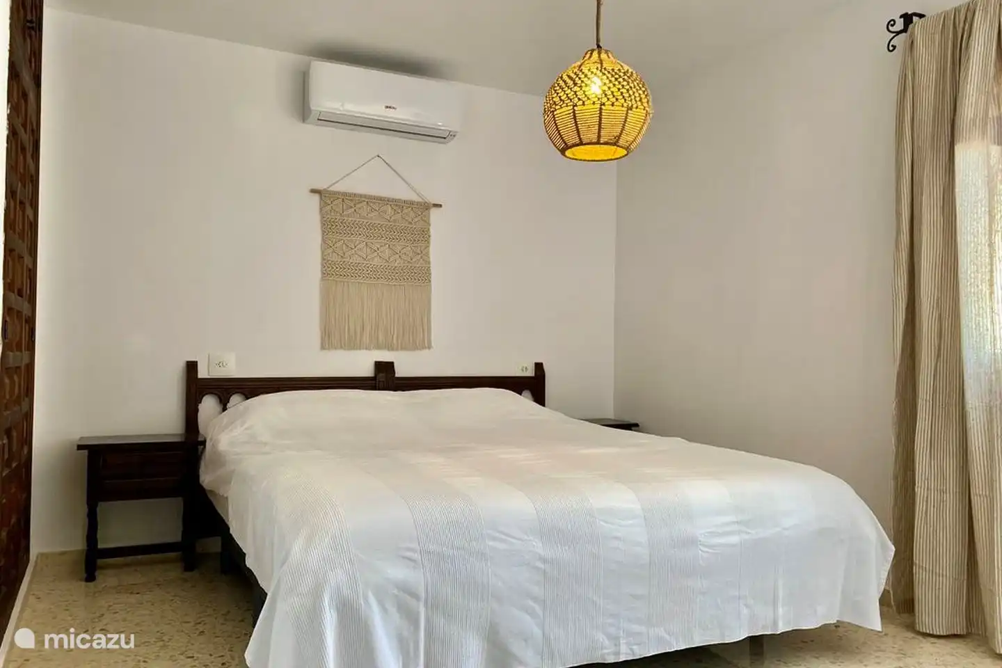 The bedrooms at Villa Olivera have individual air conditioning and comfortable beds