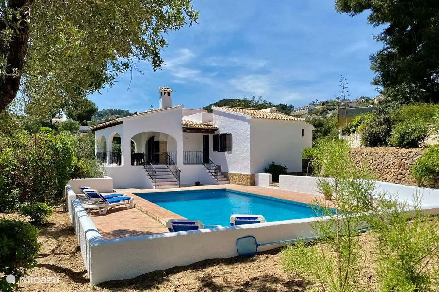 There is a spacious terrace around the swimming pool of Villa Olivera
