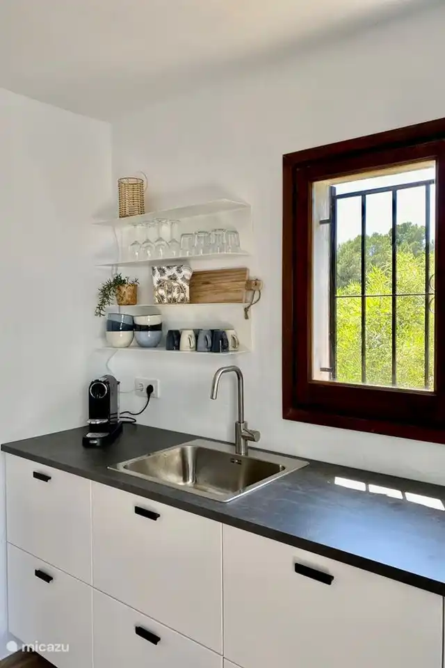 The modern kitchen is fully equipped