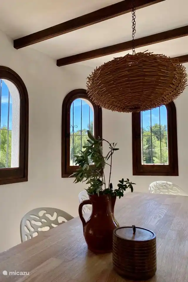 The dining room of Villa Olivera has a lot of light