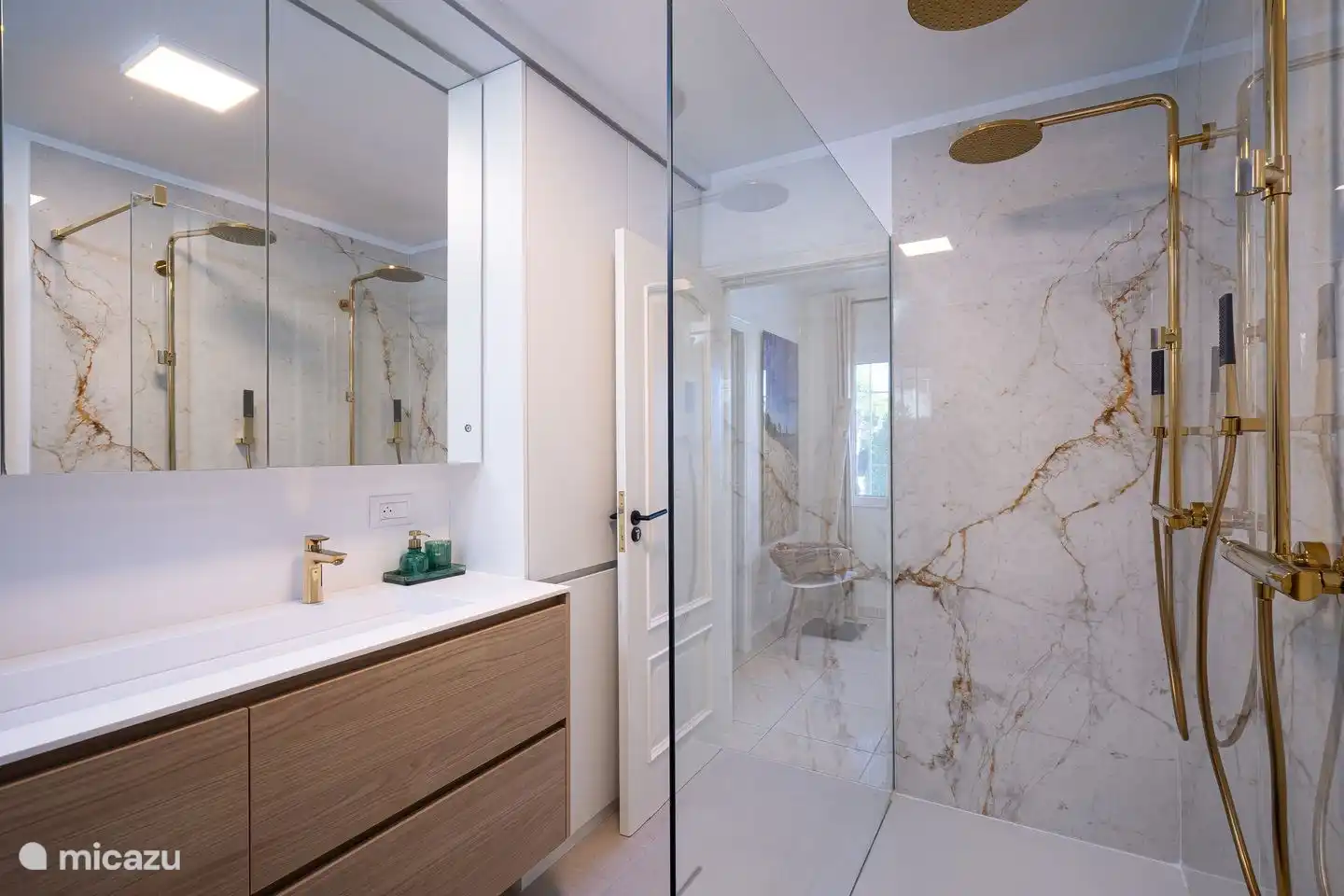 Villa La Serena in Moraira has three modern bathrooms with walk-in rain shower, sink and toilet