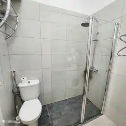 in the bathroom you will find a rain shower