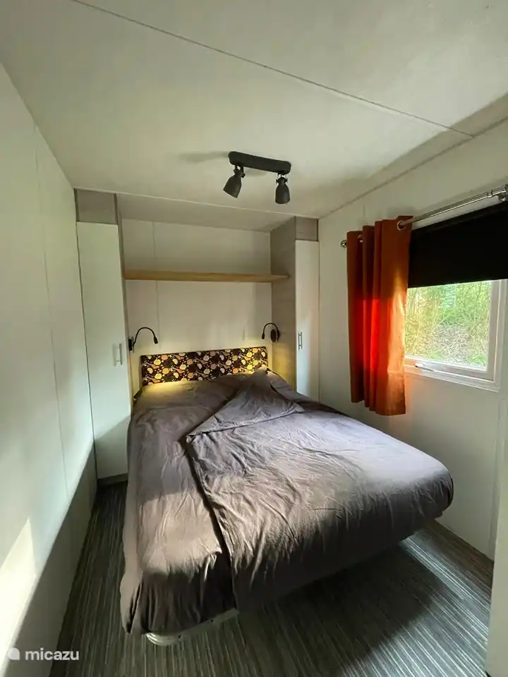Schlafzimmer 1 mit einem Doppelbett