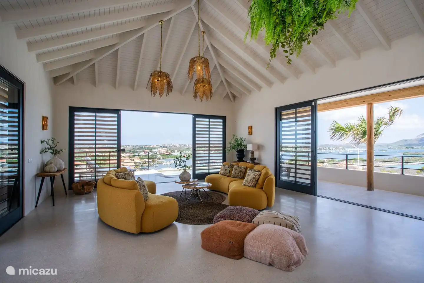 The living room has windows on all sides, which gives it a spacious feeling.