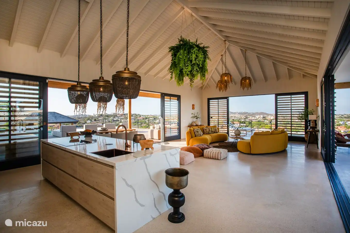 The living room with the open kitchen