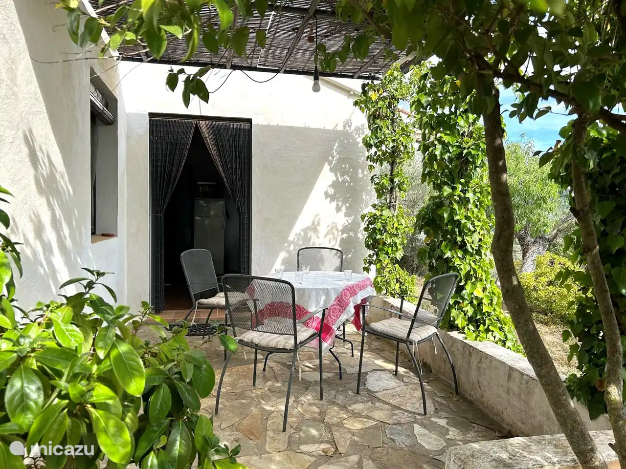 The terrace with the door to the kitchen.