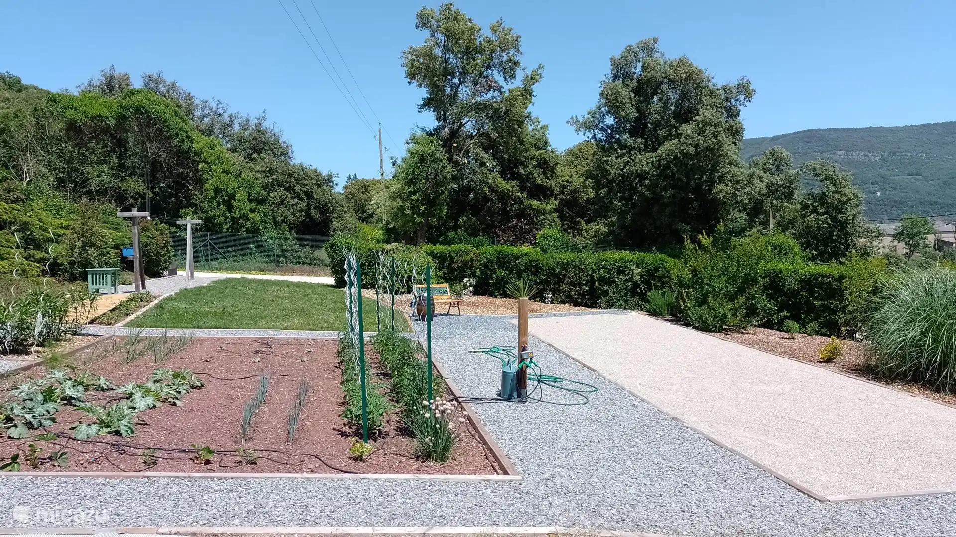 Moestuin en pétanque-baan