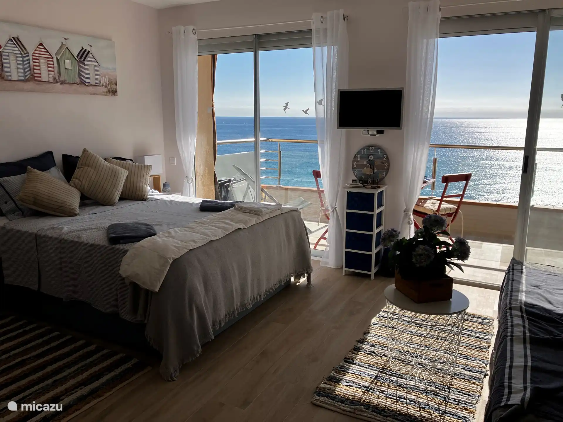 séjour/chambre avec vue mer