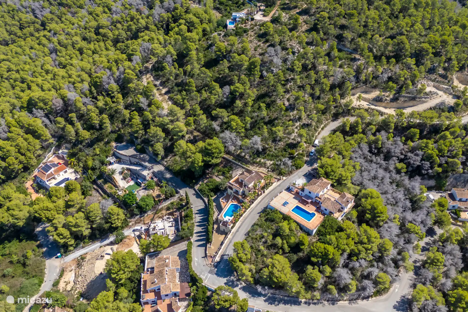 The villa is located on a quiet road in the green