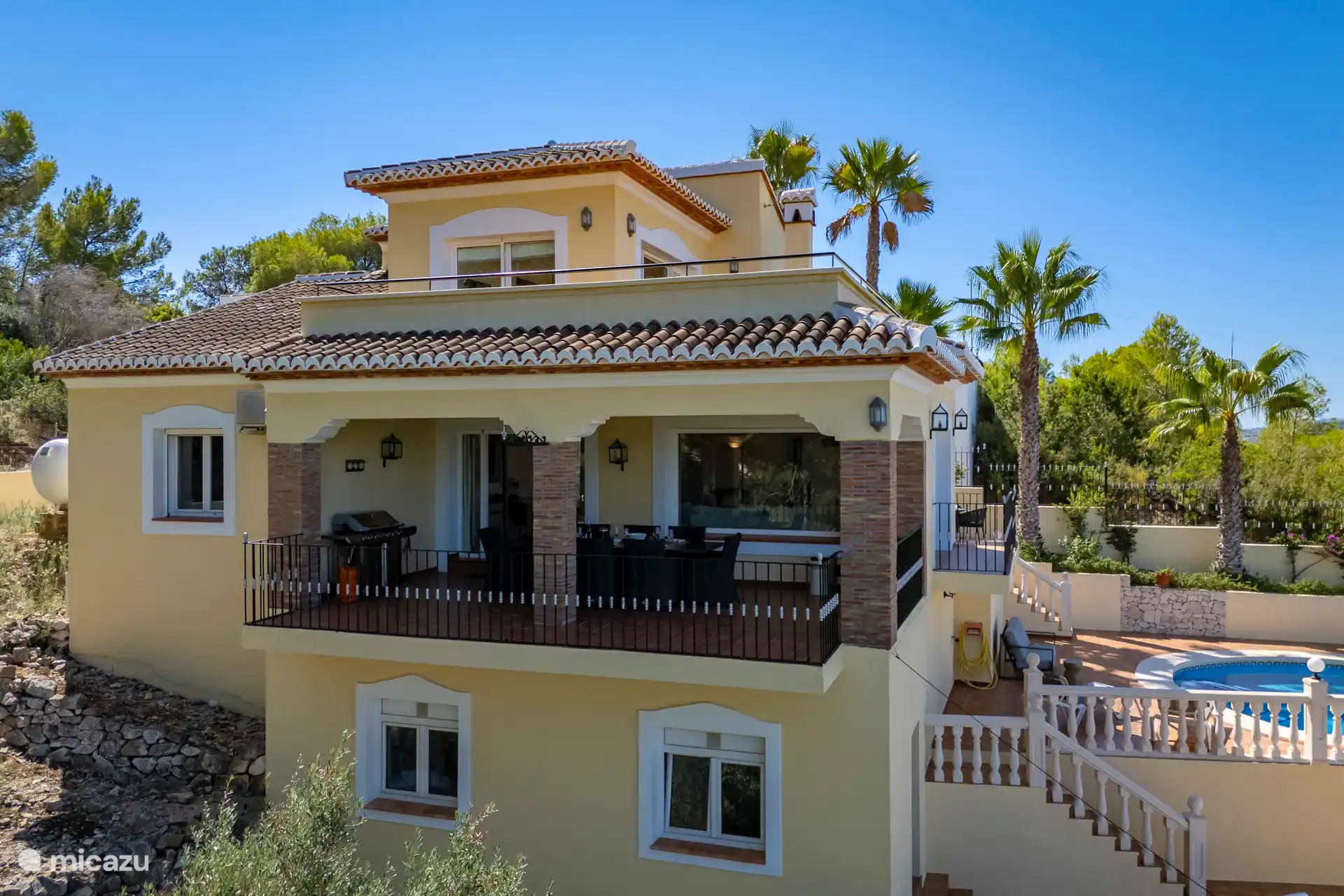 For an overview, you can see the terrace adjacent to the living room here.