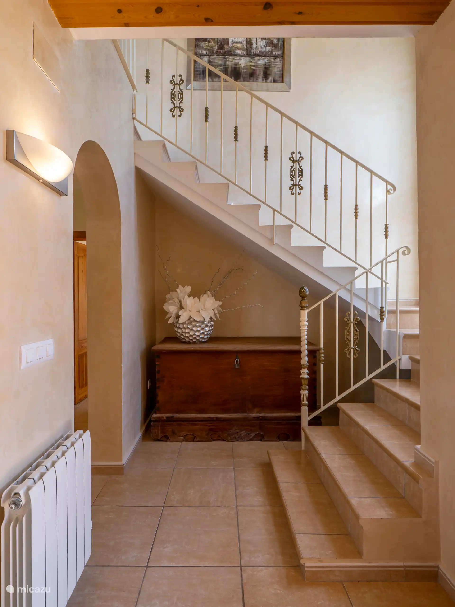 The stairs to the 3rd bedroom, 2nd bathroom and the roof terrace