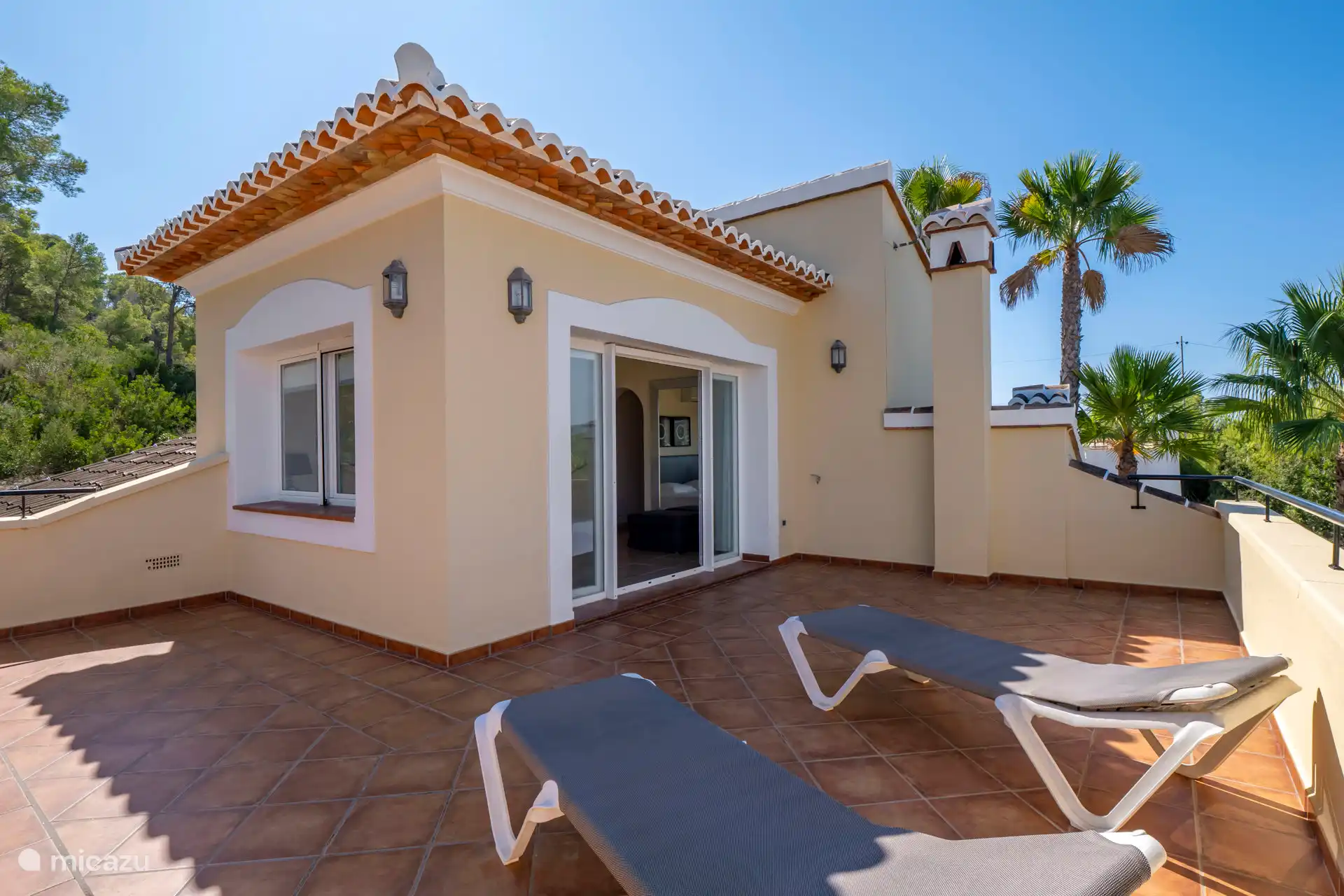 Roof terrace from bedroom 3 with sunbeds