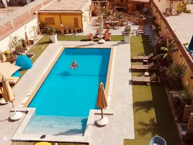 View Villa App 4pers toit app. | Égypte, Mer Rouge , Hurghada - penthouse Piscine et jardin vus de la terrasse sur le toit.