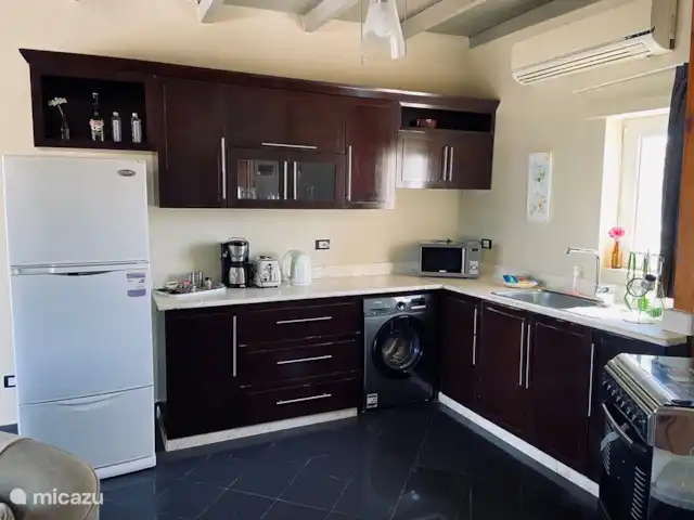 View Villa App 4pers toit app. | Égypte, Mer Rouge , Hurghada - penthouse Cuisine avec gazinière/four, combi micro-ondes, bouilloire, grille-pain, cafetière, réfrigérateur avec congélateur et un lave-linge.