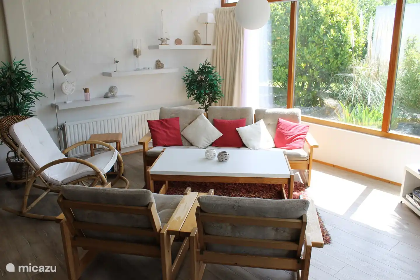 lounge with a view of the garden and patio doors.