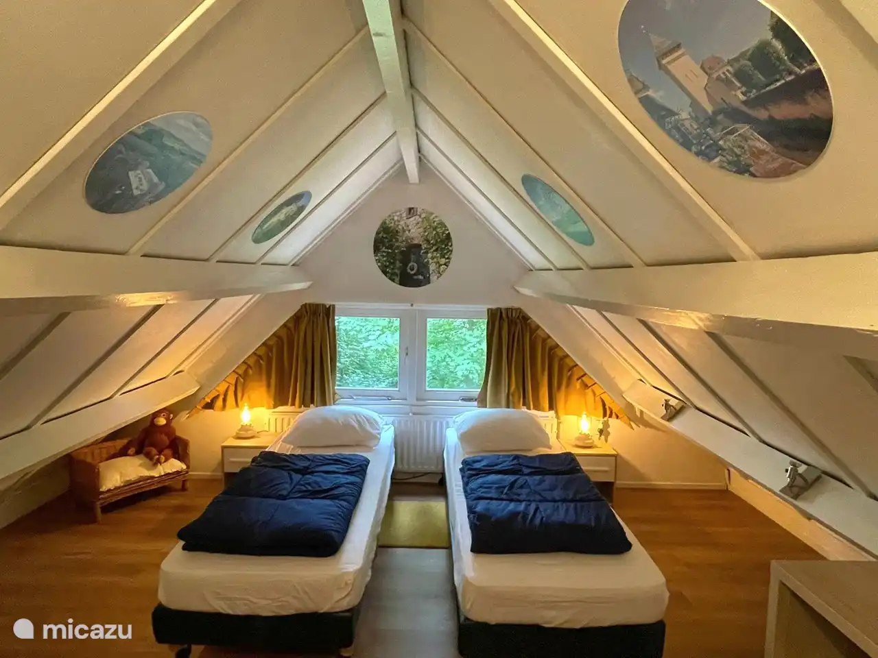 Upstairs bedroom with 2 single beds. beds, 2 bedside tables and storage space for clothes