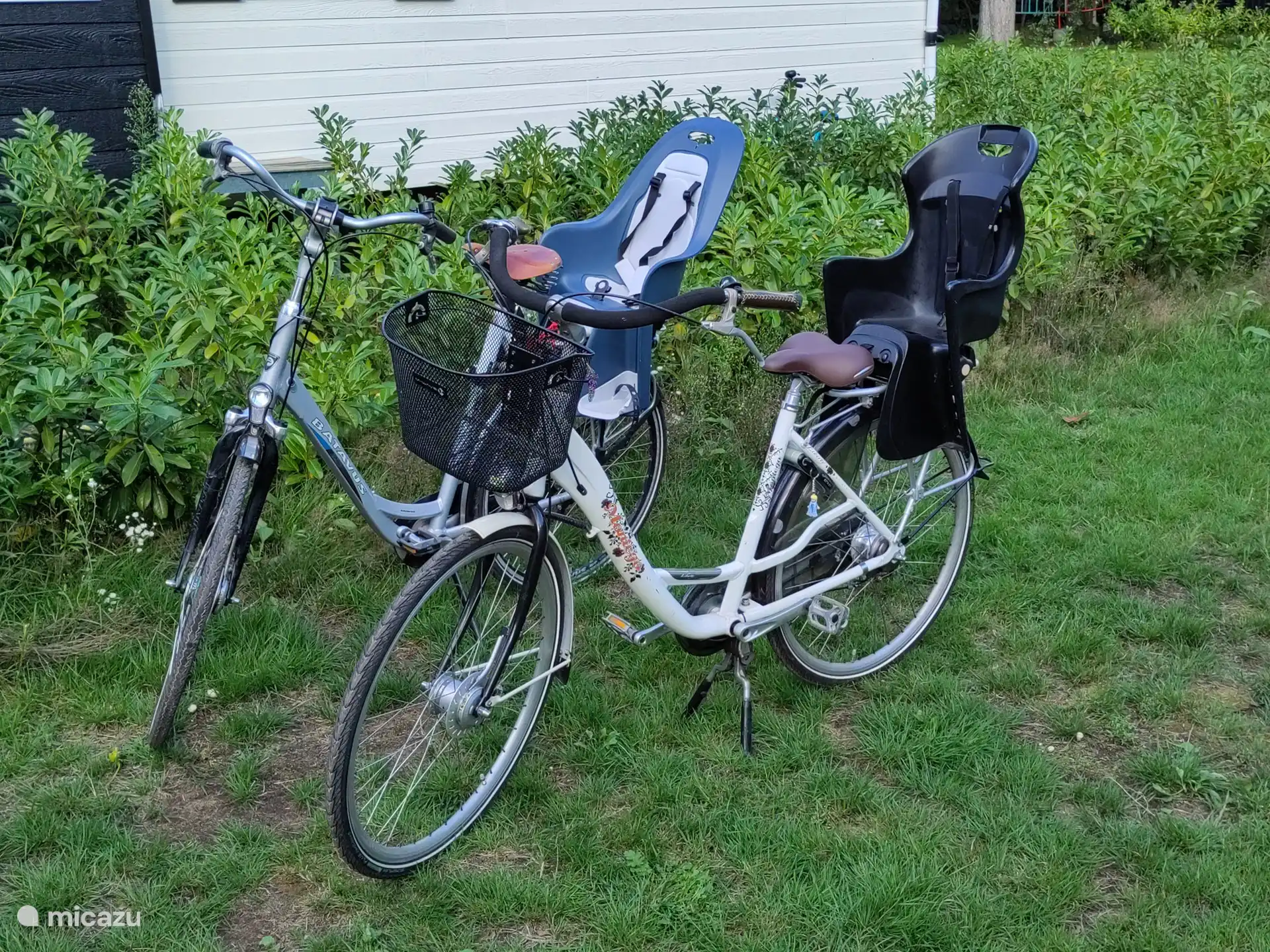 2 bicycles with child seat included